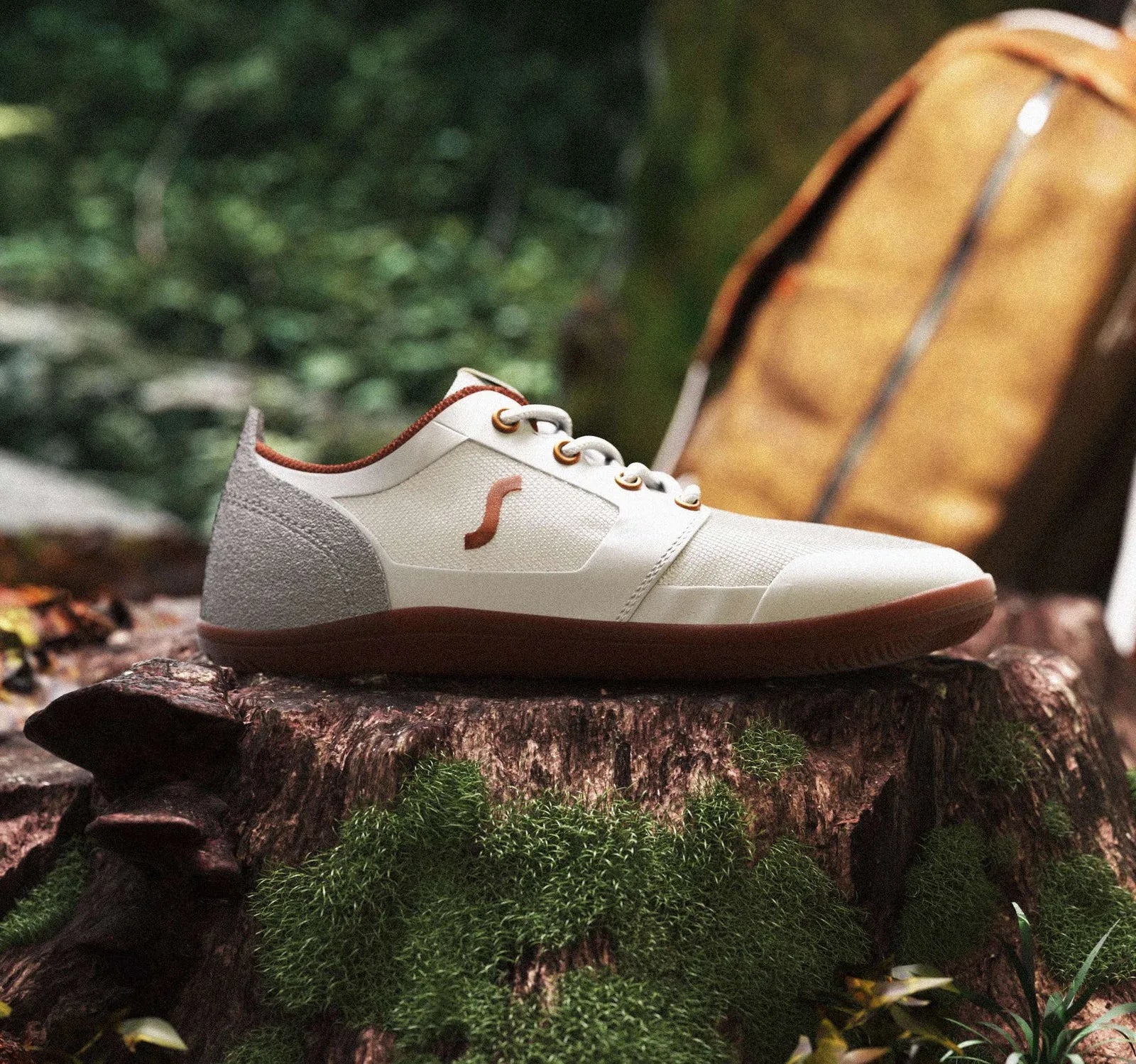 Sapmok barefoot shoe resting on moss in the forest
