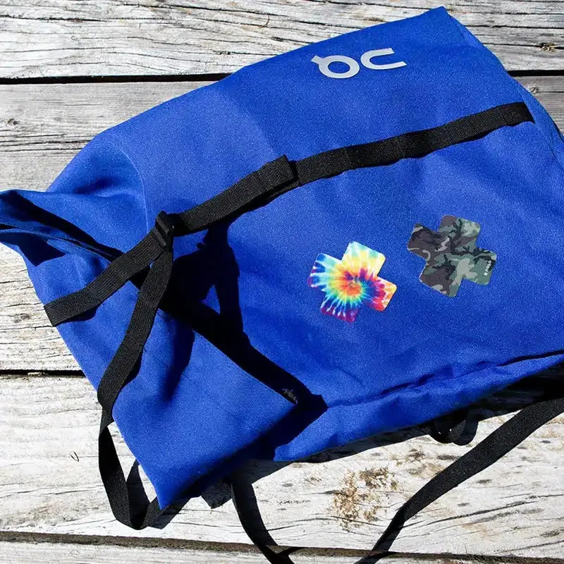 Camo Noso patch repairing a blue bag