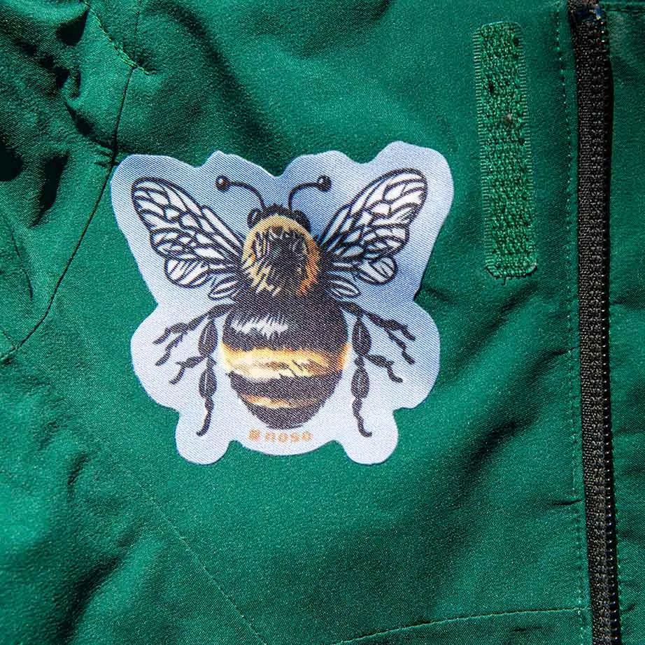 Bumble bee Noso patch on a green jacket